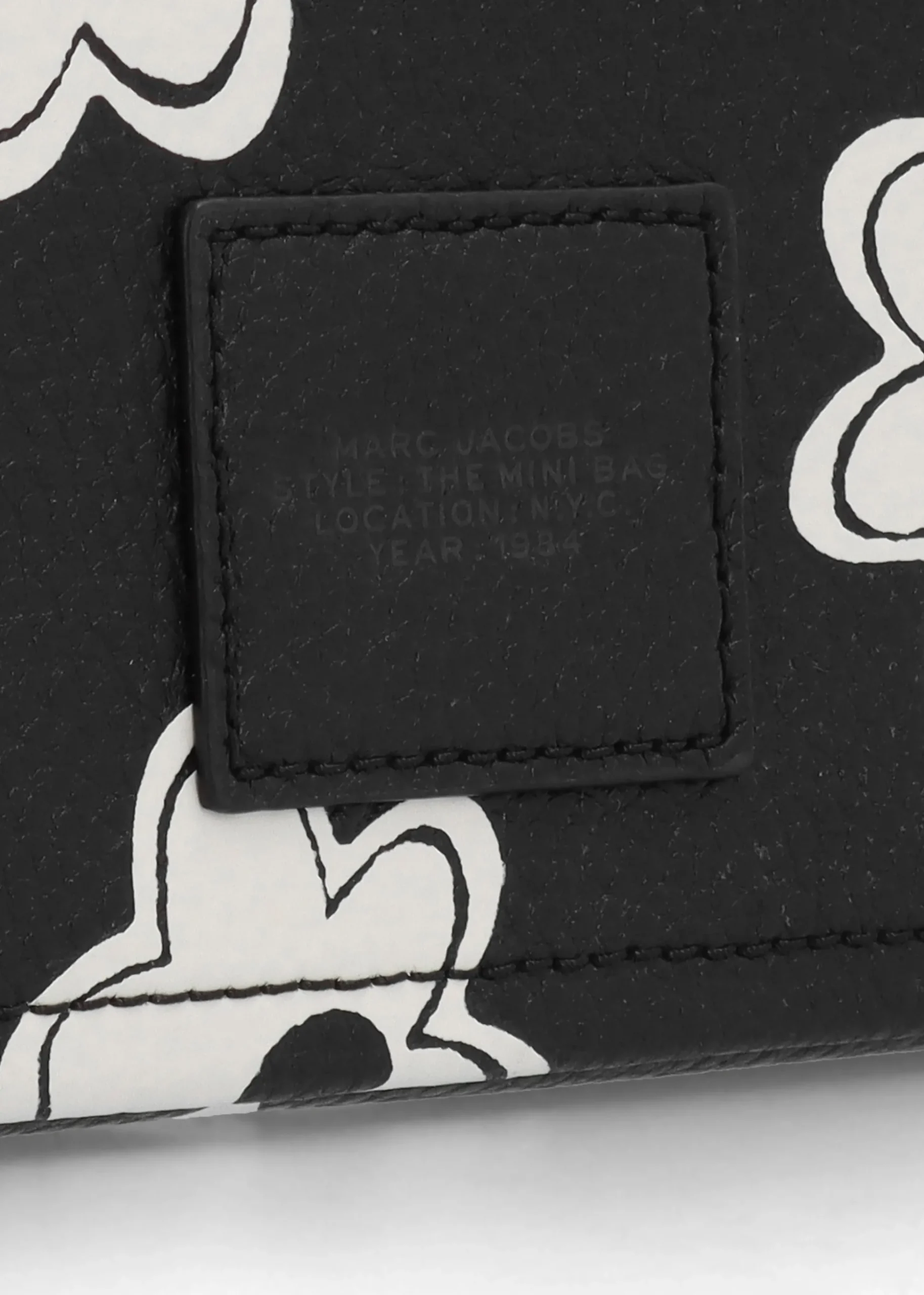 The Daisy Mini Black White Leather Cross-Body Bag